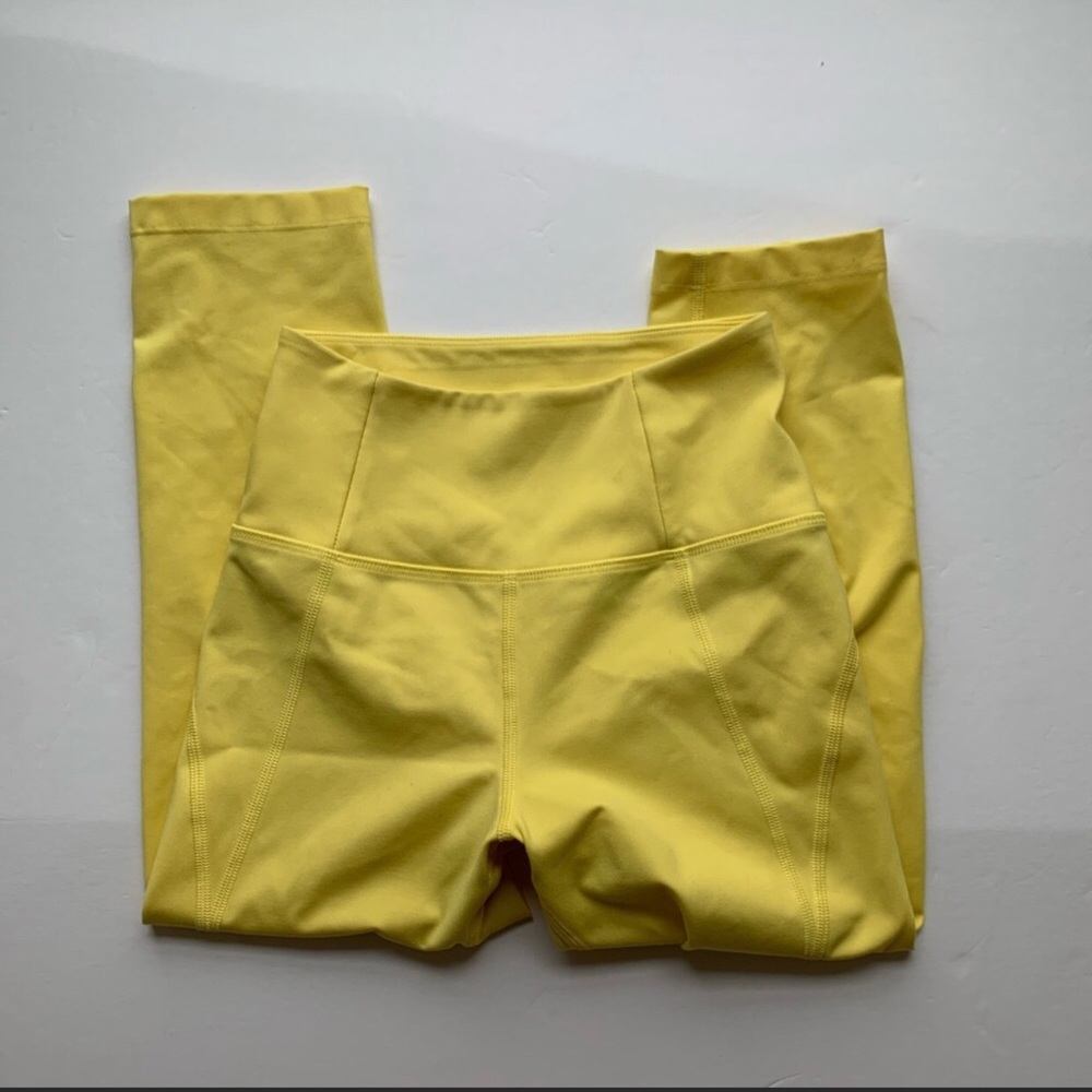 Girlfriend Collective capri length yellow tights. Size XS.
